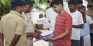 Students arriving for the NEET (UG) 2026 examination at an exam centre