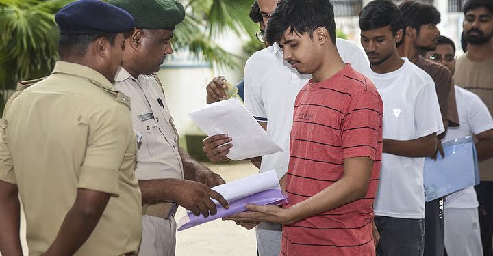 Students arriving for the NEET (UG) 2026 examination at an exam centre