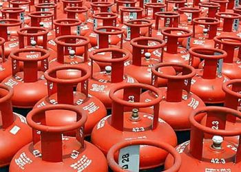 Commercial LPG cylinders stacked at a gas distribution center after the latest LPG price hike in June 2026.