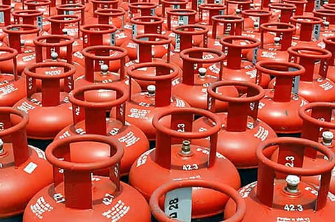 Commercial LPG cylinders stacked at a gas distribution center after the latest LPG price hike in June 2026.